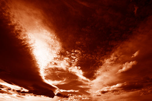 Curving Black Charred Sunset Clouds (Orange Shade Photo)