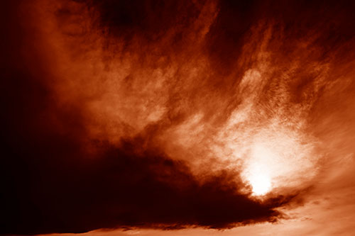 Dark Cloud Mass Holding Sun (Orange Shade Photo)