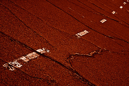 Decomposing Pavement Markings Along Sidewalk (Orange Shade Photo)