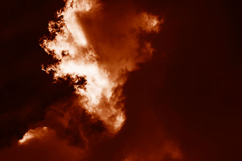 Evil Cloud Face Snarls Among Sky (Orange Shade Photo)