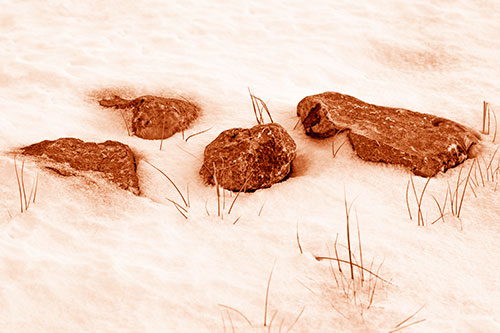 Four Big Rocks Buried In Snow (Orange Shade Photo)
