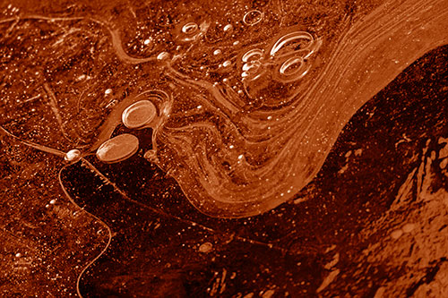Frozen Bubble Clusters Among Twirling River Ice (Orange Shade)