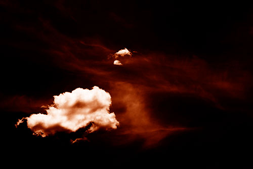 Isolated Creature Head Cloud Appears Within Darkness (Orange Shade Photo)