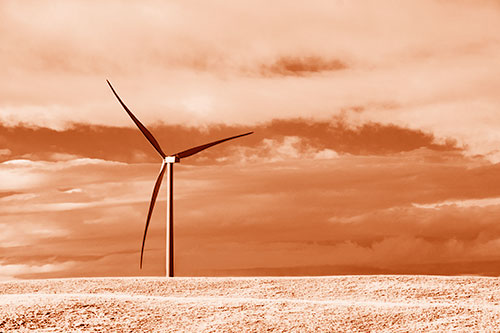Lone Wind Turbine Standing Along Dry Prairie Horizon (Orange Shade Photo)