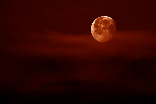 Moon Sets Behind Faint Clouds (Orange Shade Photo)