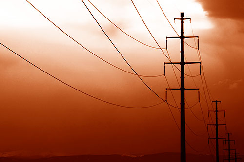 Powerlines Receding Into Thunderstorm (Orange Shade Photo)