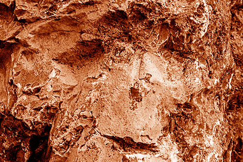 Shut Eyed Rock Face Decomposing (Orange Shade Photo)