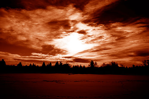 Sun Vortex Illuminates Clouds Above Dark Lit Lake (Orange Shade Photo)
