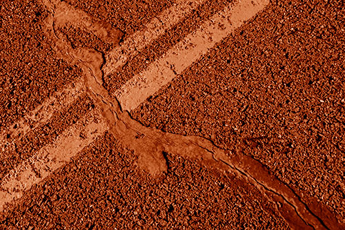 Tar Creeping Over Sidewalk Pavement Lane Marks (Orange Shade Photo)