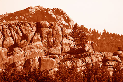 Two Towering Rock Formation Mountains (Orange Shade Photo)
