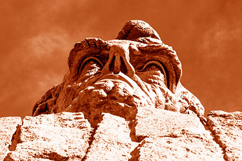 Vertical Upwards View Of Presidents Statue Head (Orange Shade Photo)