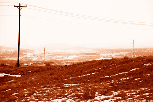 Winter Snowstorm Approaching Powerlines (Orange Shade Photo)