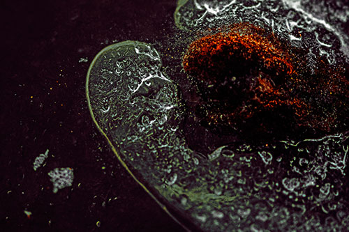 Angry Eyebrow Raised Ice Bubble Creature Bending Beside Mossy Rock (Orange Tint)