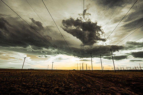 Creature Cloud Formation Above Powerlines (Orange Tint)