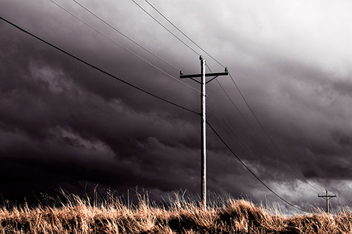 Dark Thunderstorm Clouds Over Powerline (Orange Tint Photo)