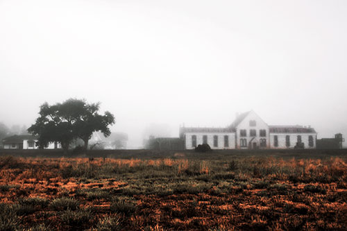 Departing Fog Reveals State Penitentiary (Orange Tint Photo)