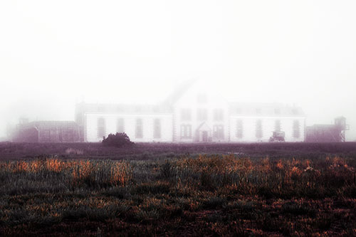 Fog Engulfs Historic State Penitentiary (Orange Tint Photo)