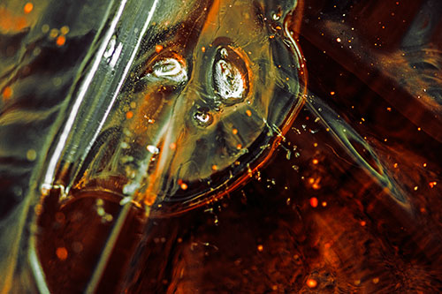 Frozen Unhappy Frowning Distorted River Ice Face (Orange Tint Photo)