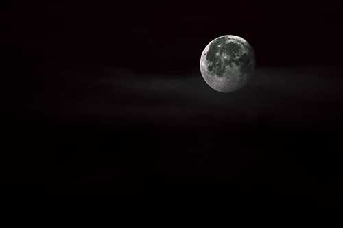 Moon Sets Behind Faint Clouds (Orange Tint Photo)