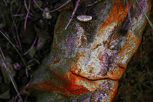 Smirking Battered Rock Face (Orange Tint)