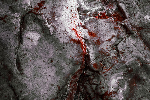 Stained Blood Splatter Rock Surface (Orange Tint Photo)
