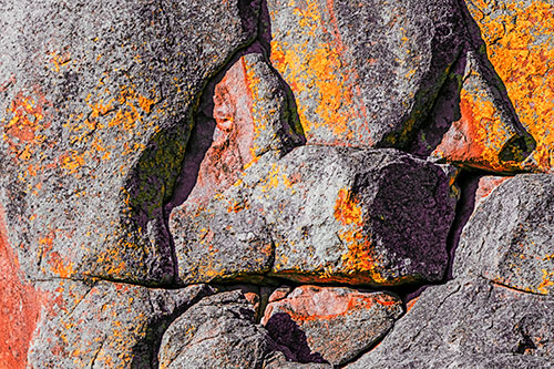 Stone Sphinx Within Rock Formation (Orange Tint Photo)