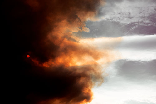 Sun Spiraling Out Of Mullen Fire Clouds (Orange Tint)