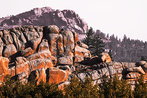 Two Towering Rock Formation Mountains (Orange Tint Photo)
