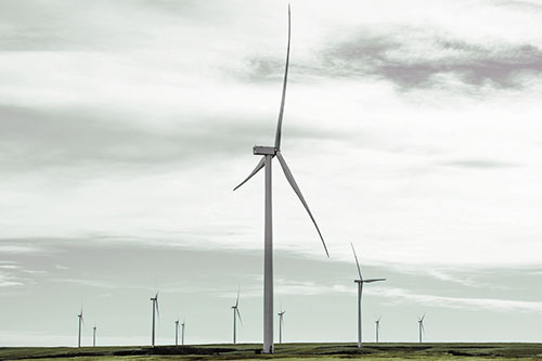 Wind Turbine Standing Tall Among The Rest (Orange Tint Photo)