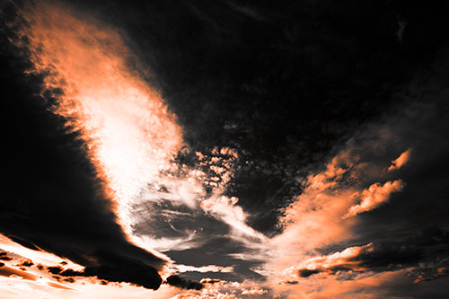 Curving Black Charred Sunset Clouds (Orange Tone Photo)
