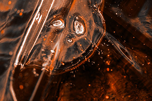 Frozen Unhappy Frowning Distorted River Ice Face (Orange Tone Photo)