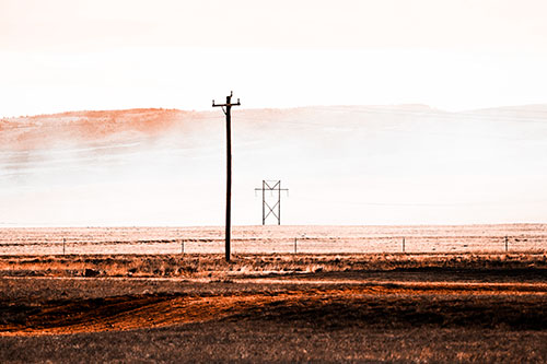 Heavy Fog Hiding Mountain Range Behind Powerlines (Orange Tone Photo)