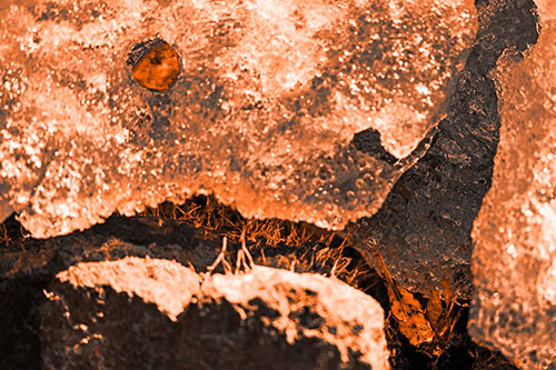 Ice Melting Crevice Mouthed Rock Face (Orange Tone Photo)
