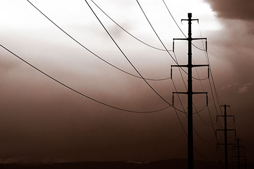 Powerlines Receding Into Thunderstorm (Orange Tone Photo)