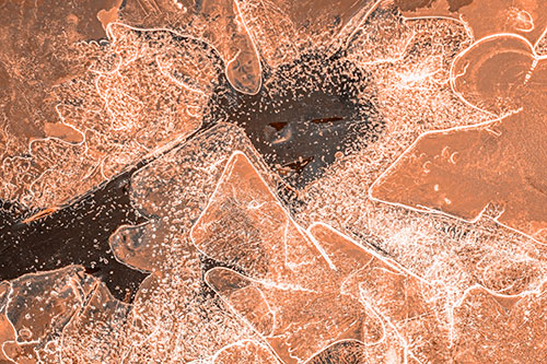 Smug Ice Face Among Frozen River Water (Orange Tone)