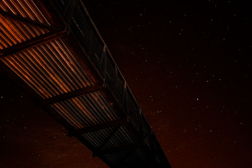 Stars Shining Above Walkway Bridge (Orange Tone Photo)