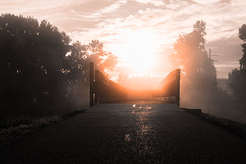 Sun Rises Beyond Foggy Wooden Walkway Bridge (Orange Tone Photo)