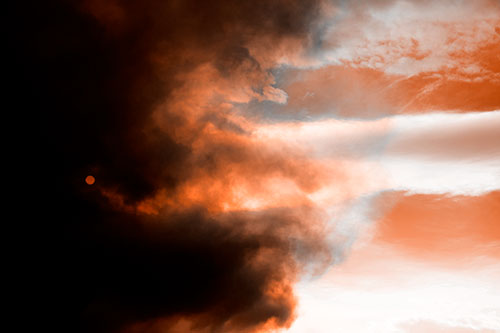 Sun Spiraling Out Of Mullen Fire Clouds (Orange Tone Photo)