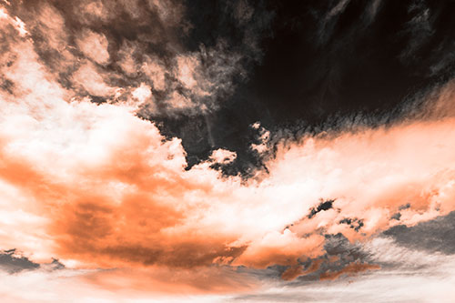 Sunset Illuminating Large Cloud Mass (Orange Tone Photo)