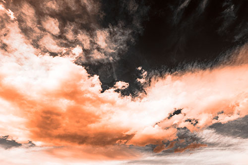 Sunset Illuminating Large Cloud Mass (Orange Tone Photo)