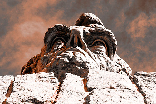 Vertical Upwards View Of Presidents Statue Head (Orange Tone Photo)