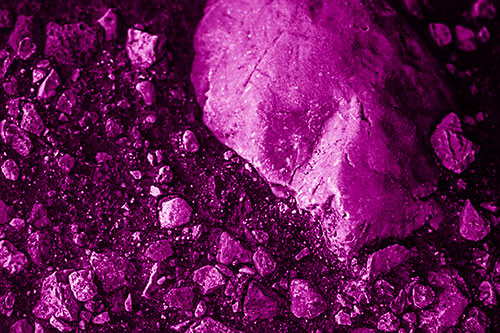 Alien Skull Rock Face Emerging Atop Dirt Surface (Pink Shade Photo)