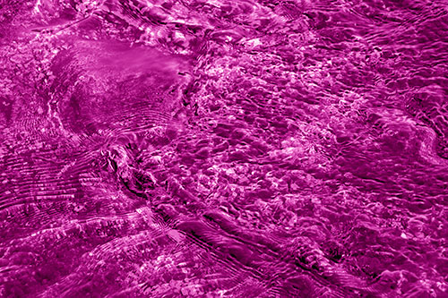 Large Algae Rock Creating River Water Ripples (Pink Shade Photo)