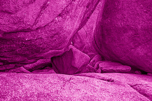 Large Crowded Boulders Leaning Against One Another (Pink Shade Photo)