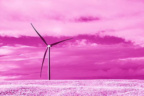Lone Wind Turbine Standing Along Dry Prairie Horizon (Pink Shade Photo)