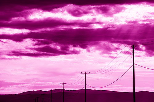 Powerline Silhouette Entering Mountain Range (Pink Shade Photo)