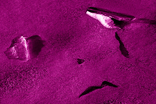 Sad Teardrop Ice Face Appears Atop Frozen River (Pink Shade Photo)