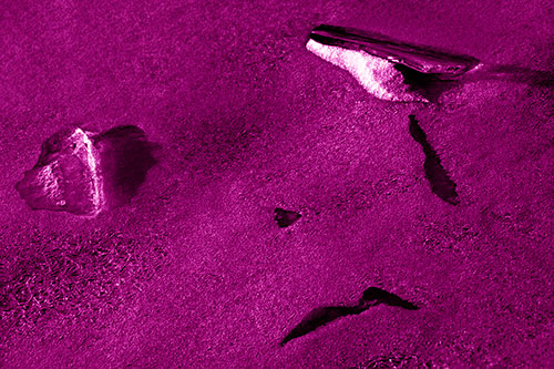 Sad Teardrop Ice Face Appears Atop Frozen River (Pink Shade)