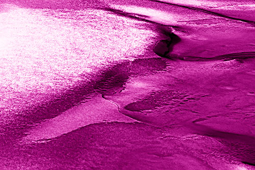Sloping Ice Melting Atop River Water (Pink Shade Photo)