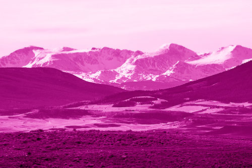 Snow Capped Mountains Behind Hills (Pink Shade Photo)